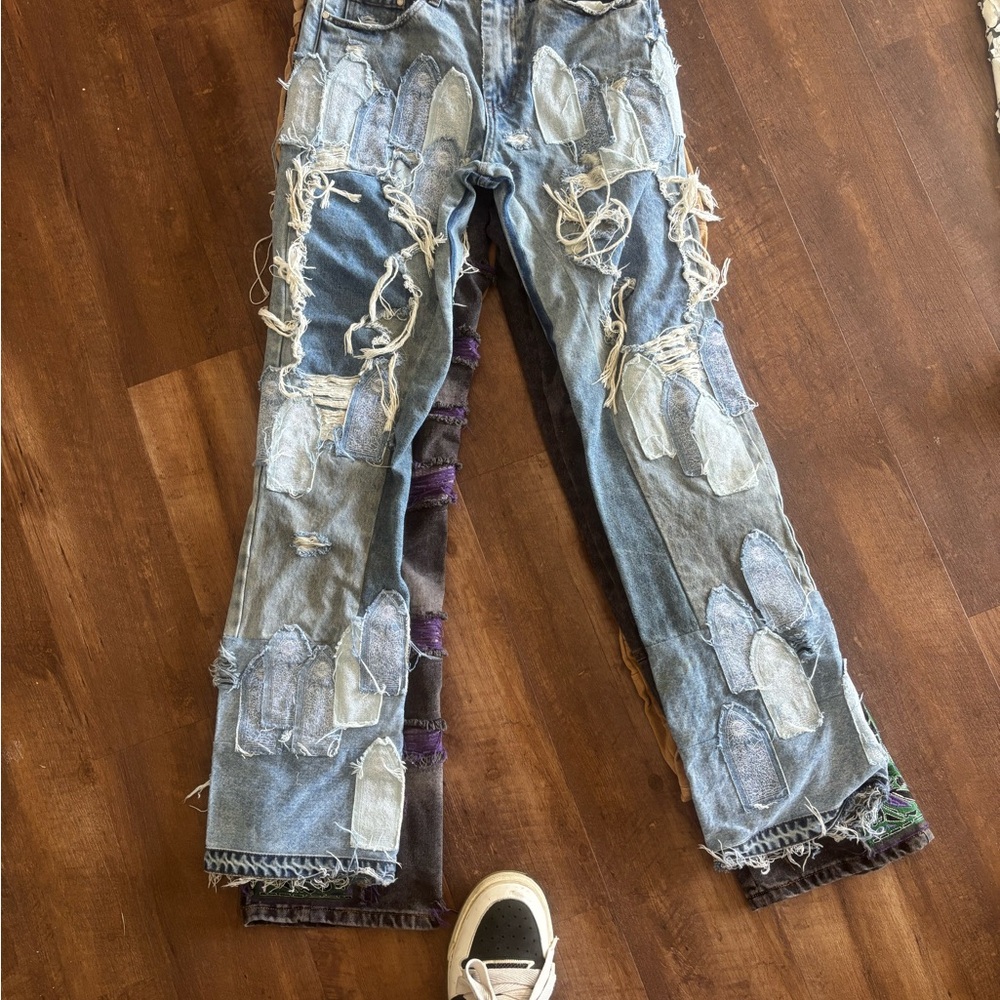 Who Decides War Distressed Blue Jeans